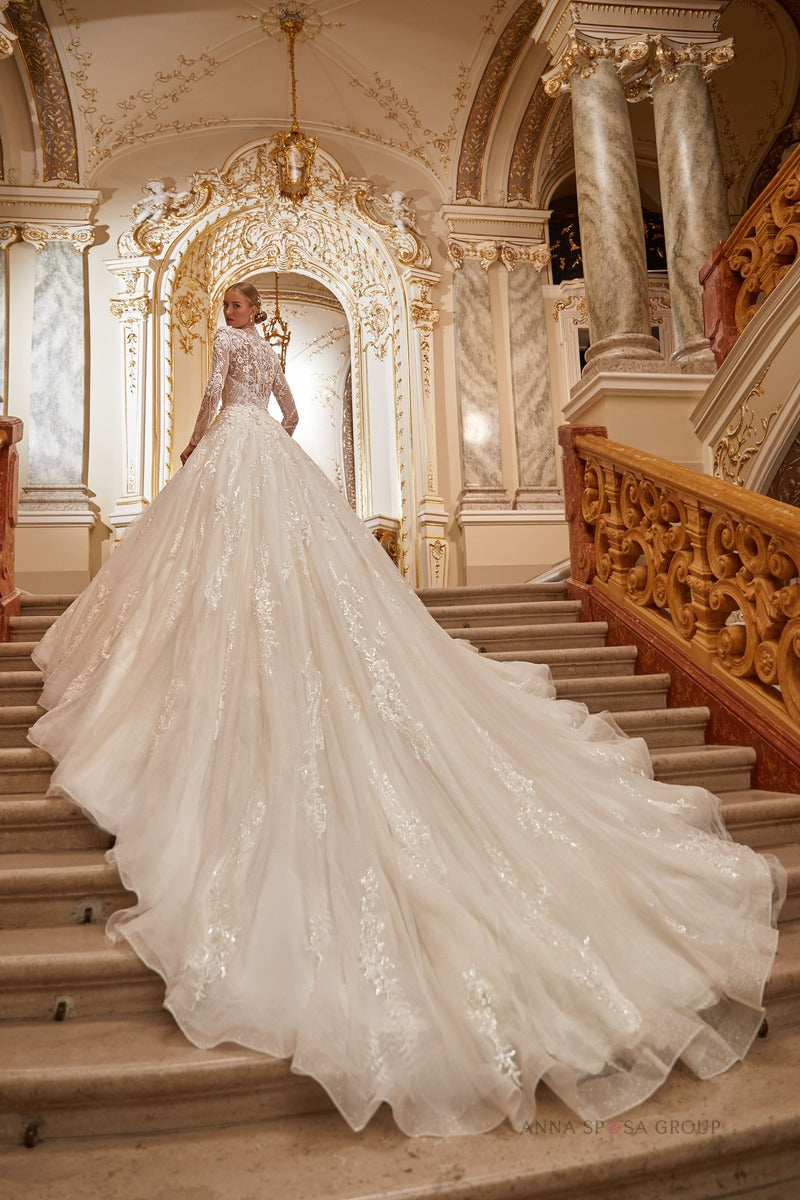 NARMA An amazing beaded wedding dress with very long train