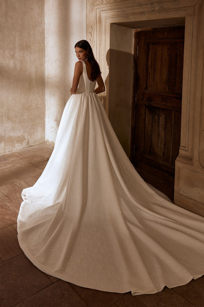 MARVIN Printed brocade. Square neckline bodice on a full pleated skirt