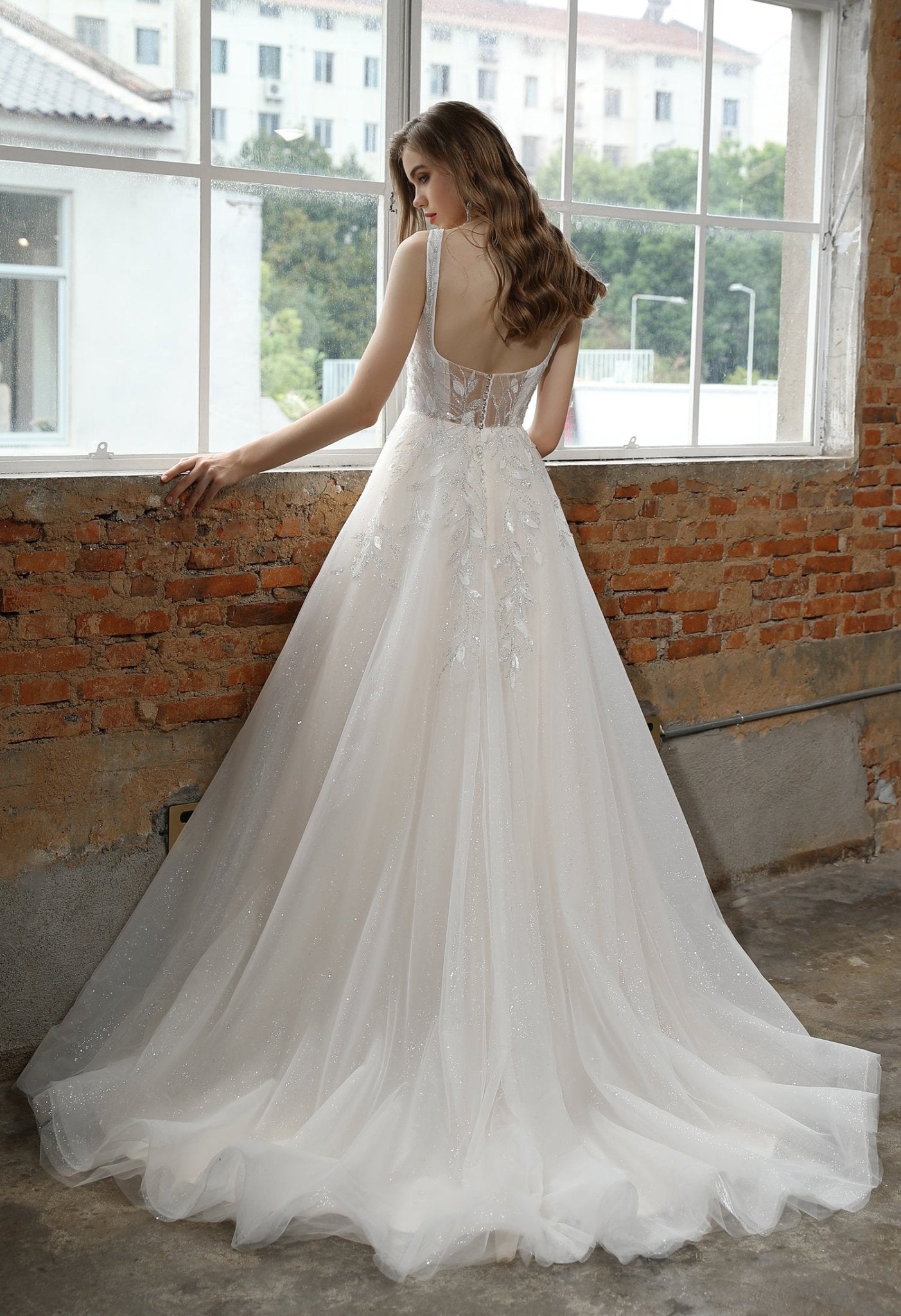 ESTER A leafy trailing design on a square neckline bodice. A - line skirt - Reflections Bridal Studio