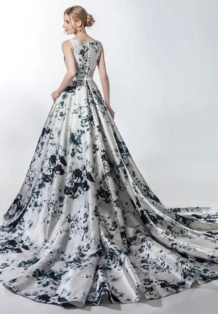 FANTASY A pleated A - line skirt and round neck bodice in bold Floral pattern - Reflections Bridal Studio