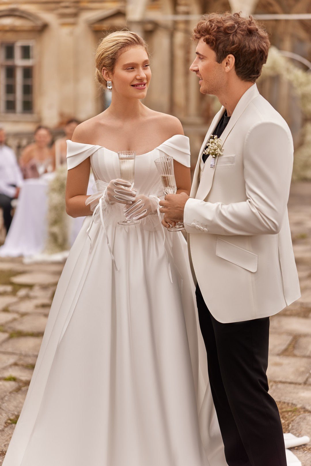 LULU NV A matte satin ballgown with basque style bodice - Reflections Bridal Studio