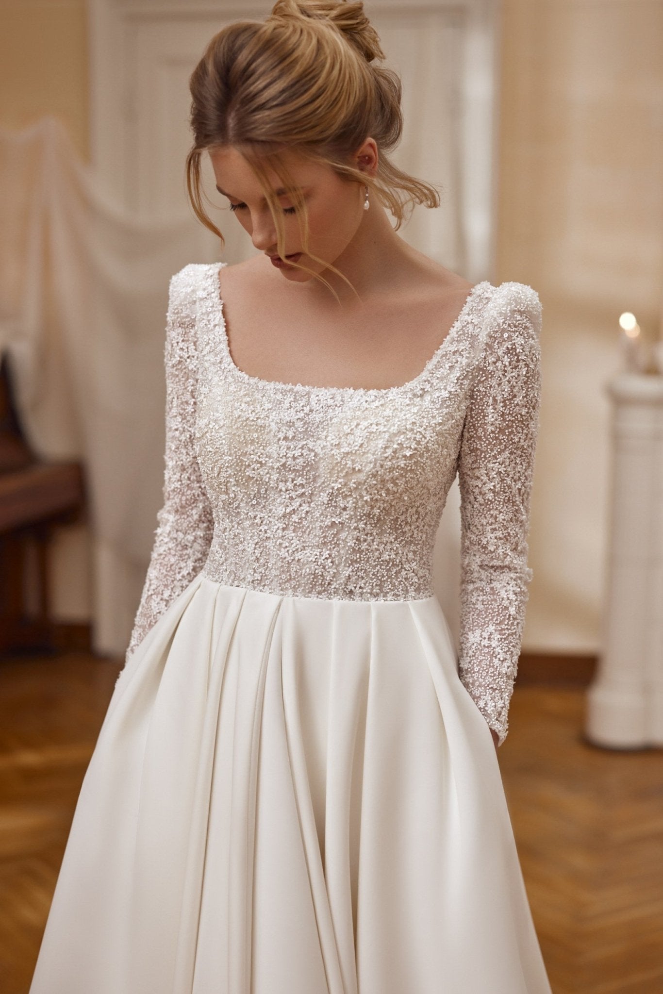 MARTA - Fine beaded lace bodice with square neckline. Long sleeves Pockets - Reflections Bridal Studio