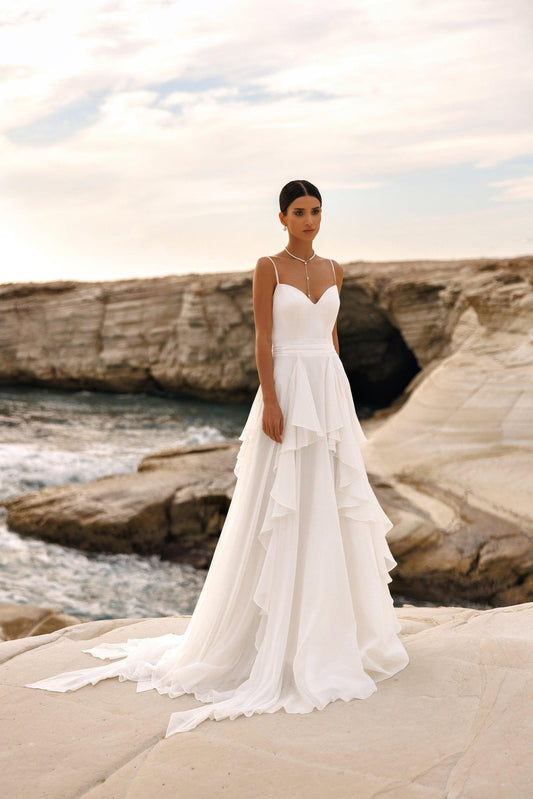 ZINNIA Chiffon gown with ruffle skirt and detachable jacket - Reflections Bridal Studio