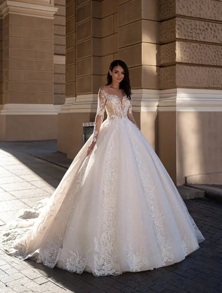 #BRYNN A stunning ballgown style with long beaded lace sleeves