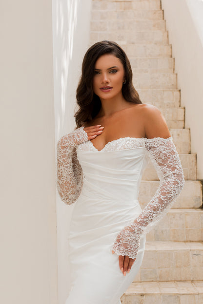 GRAZIANA Silky satin gown with off-the-shoulder neckline and long sleeves in beaded lace