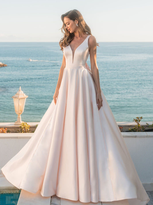 ANGIE ARRIVING SOON - Reflections Bridal Studio