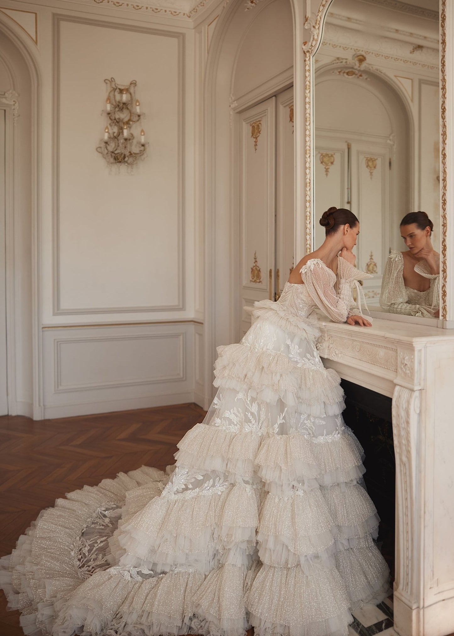 BASSEMA Indulgent layers of ruffles with glitter and lace. Detachable sleeves - Reflections Bridal Studio