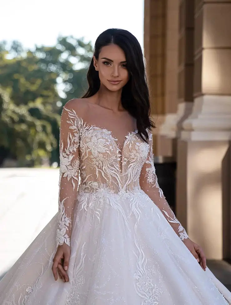 #BRYNN A stunning ballgown style with long beaded lace sleeves