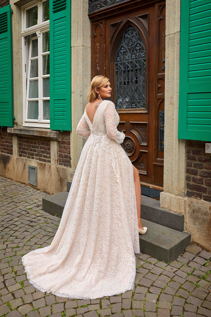 DANIELA Blush A-line long sleeves wrap over bodice - Reflections Bridal Studio