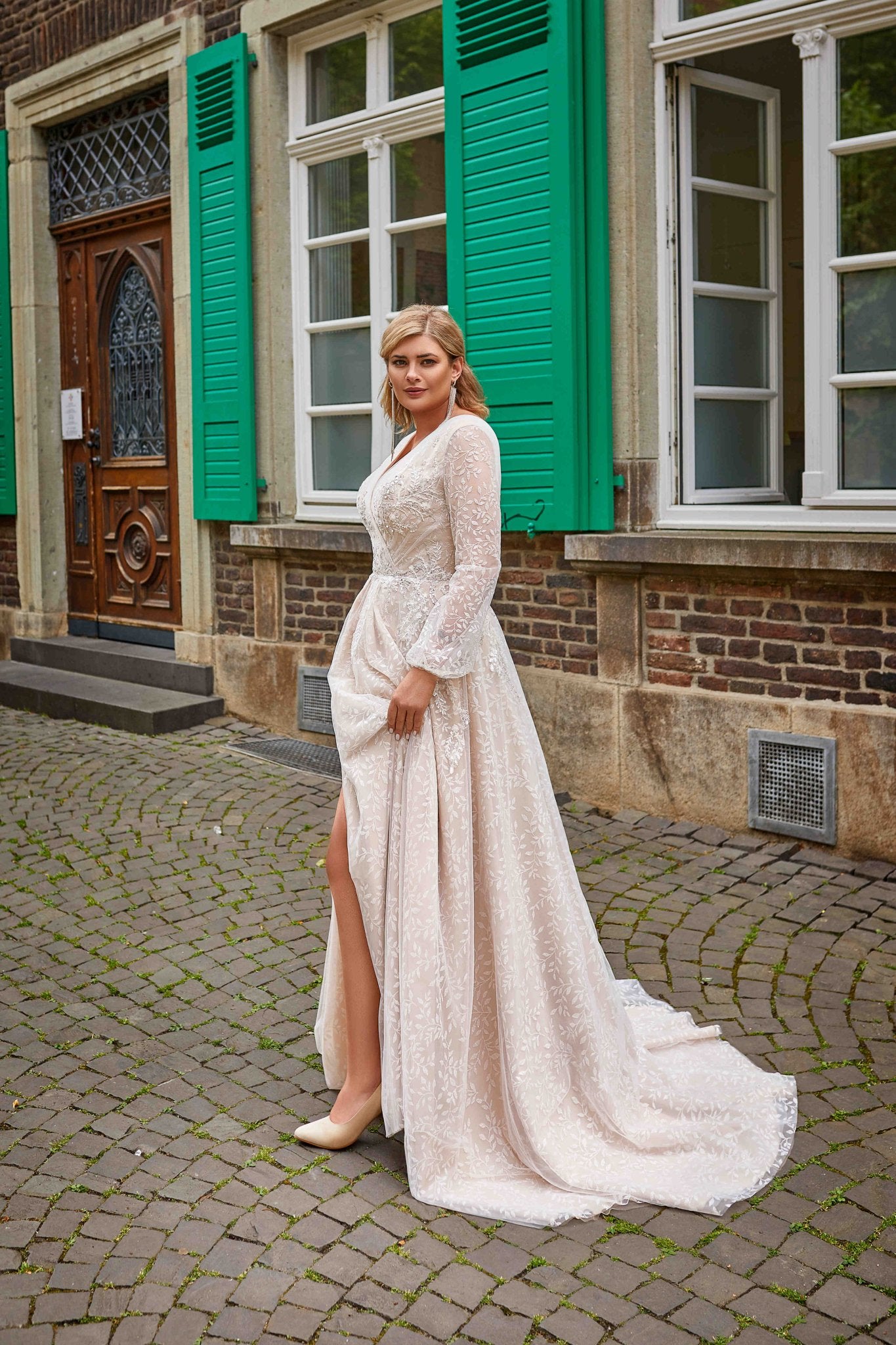 DANIELA Blush A-line long sleeves wrap over bodice - Reflections Bridal Studio