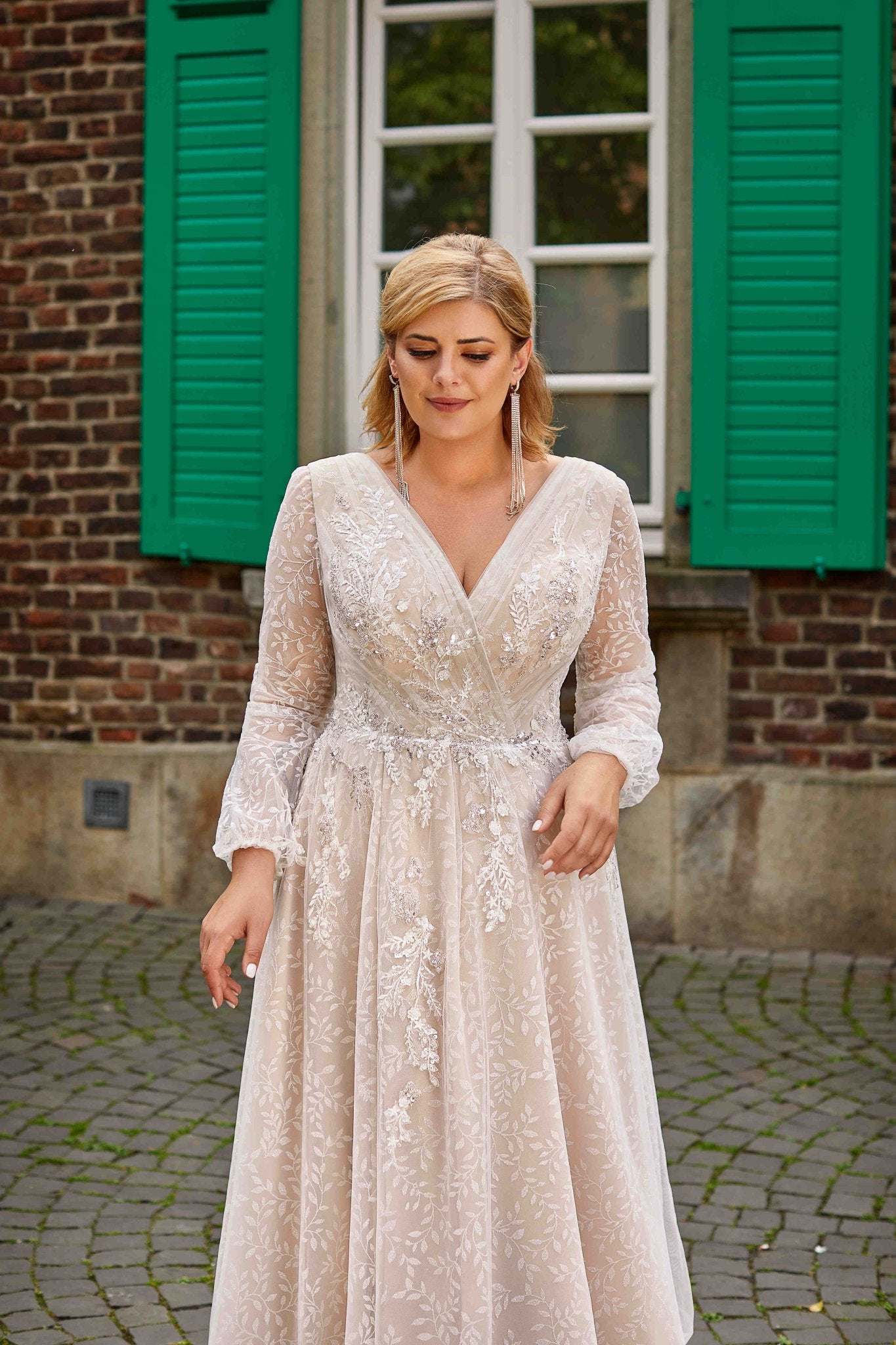 DANIELA Blush A-line long sleeves wrap over bodice - Reflections Bridal Studio