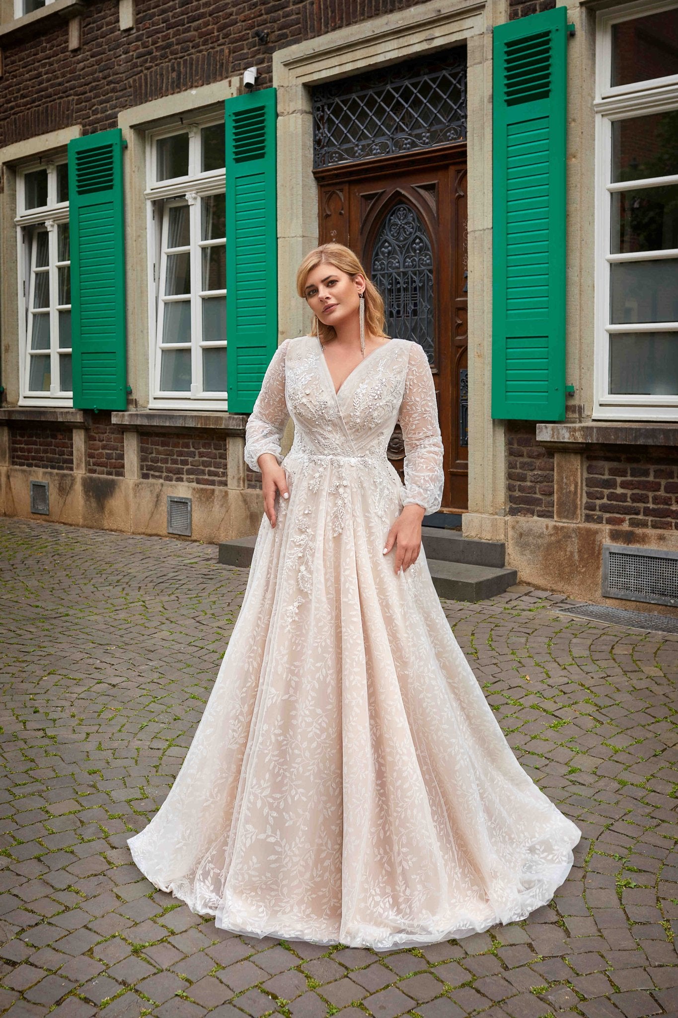 DANIELA Blush A-line long sleeves wrap over bodice - Reflections Bridal Studio