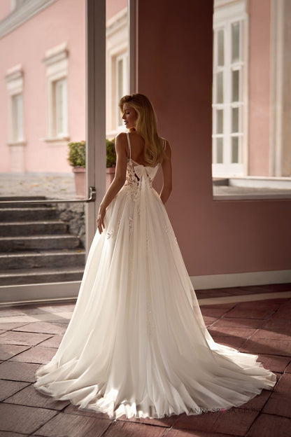 DATTERA Beaded floral lace and tulle A - line gown - Reflections Bridal Studio