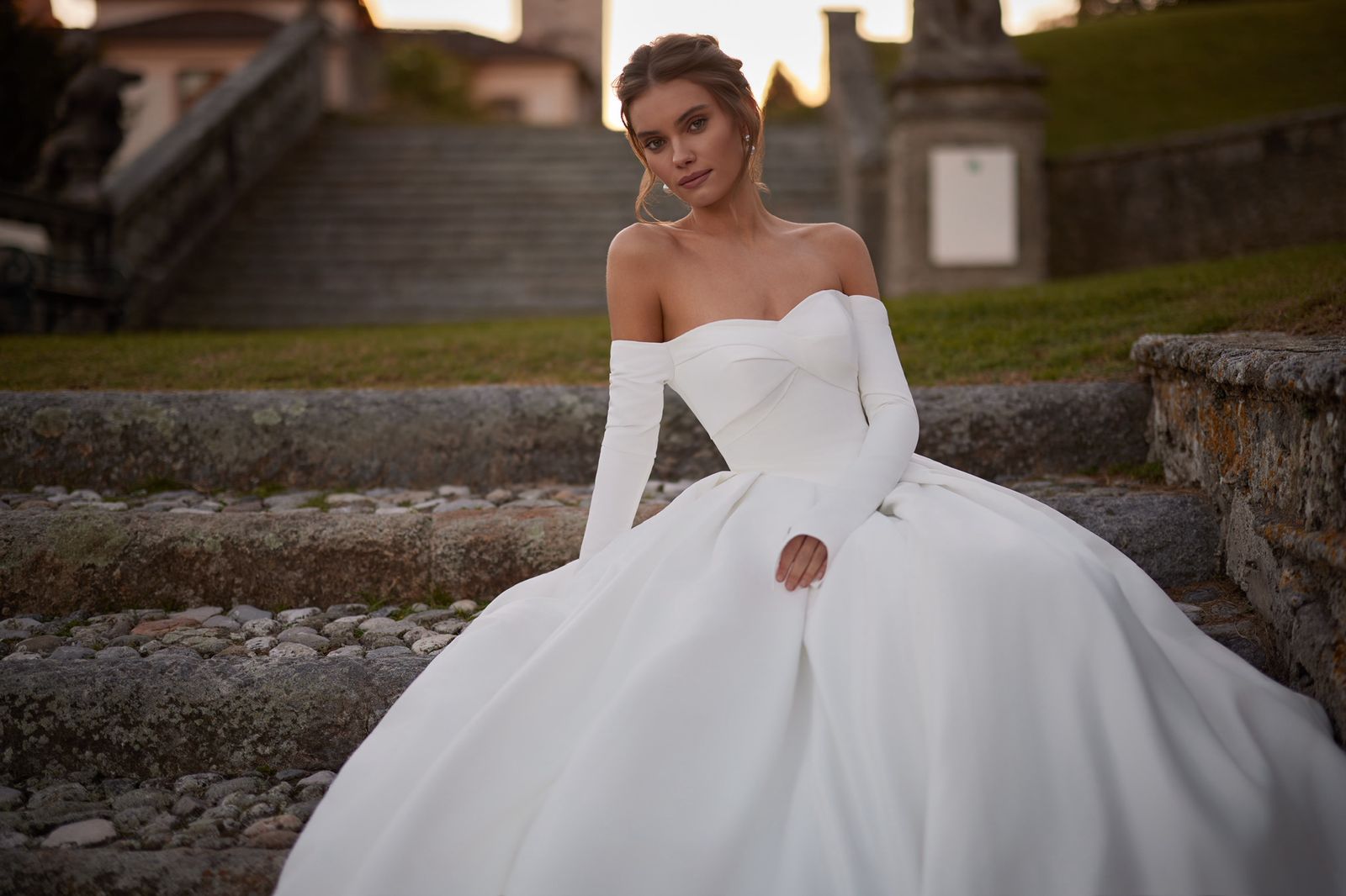  IVORA Satin gown with pleated skirt - Reflections Bridal Studio