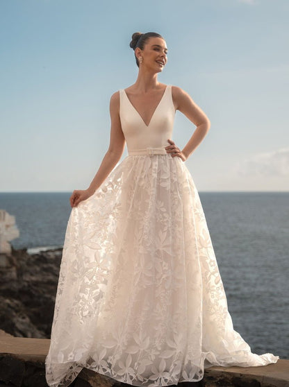 JUSTINE Floral organza skirt on a crepe V - neck bodice - Reflections Bridal Studio