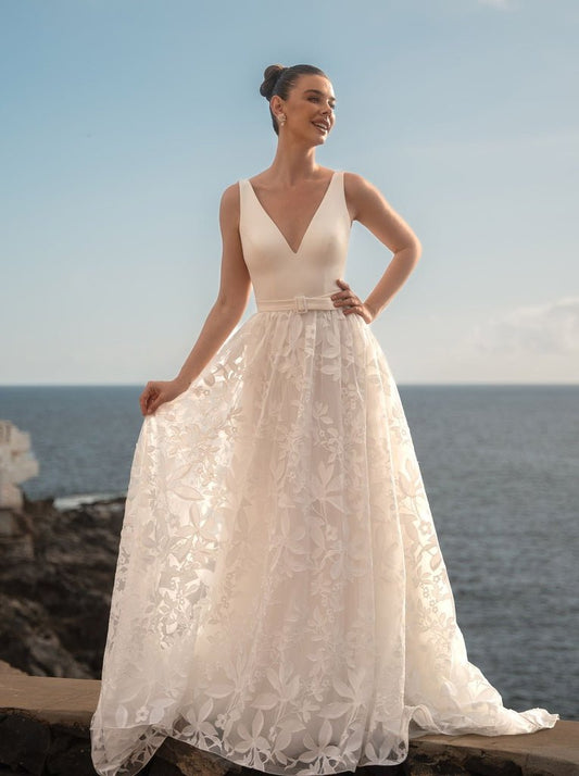 JUSTINE Floral organza skirt on a crepe V - neck bodice - Reflections Bridal Studio