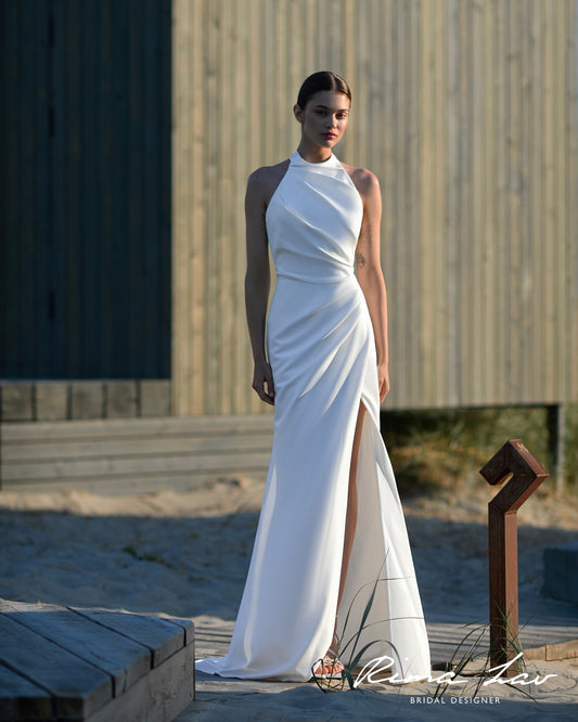 AVIS Soft satin halterneck gown. Ruched wrap-over skirt