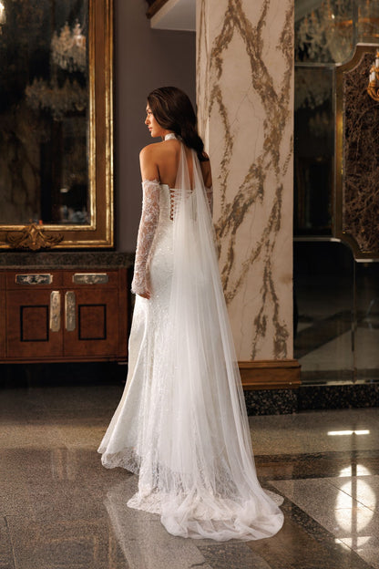 LILITH Assymetric draping on a sculpted corset gown - Reflections Bridal Studio