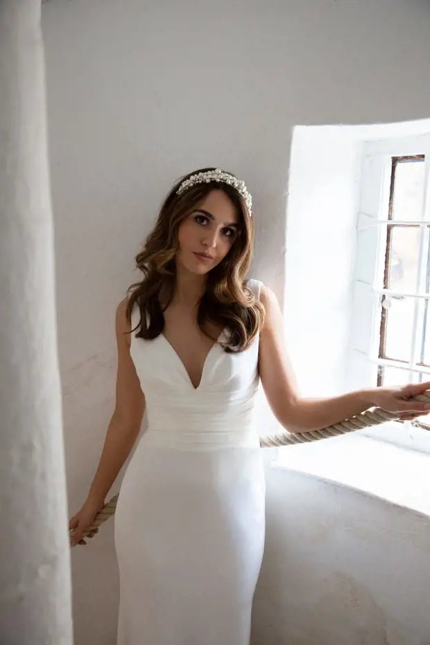 LIVVY fit and flare crepe and satin buttons down train - Reflections Bridal Studio