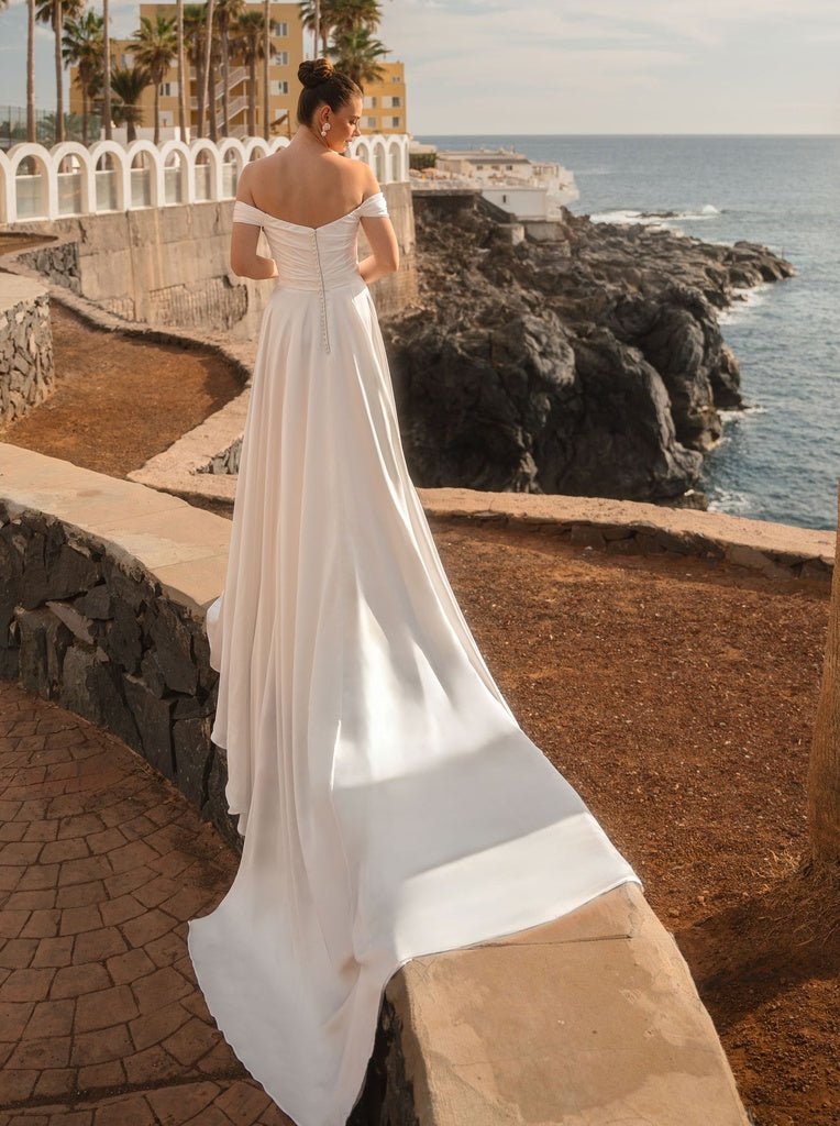 #MELODY Soft satin A-line gown with bardot neckline - Reflections Bridal Studio
