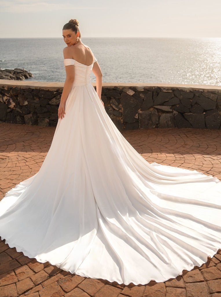 #MELODY Soft satin A-line gown with bardot neckline - Reflections Bridal Studio