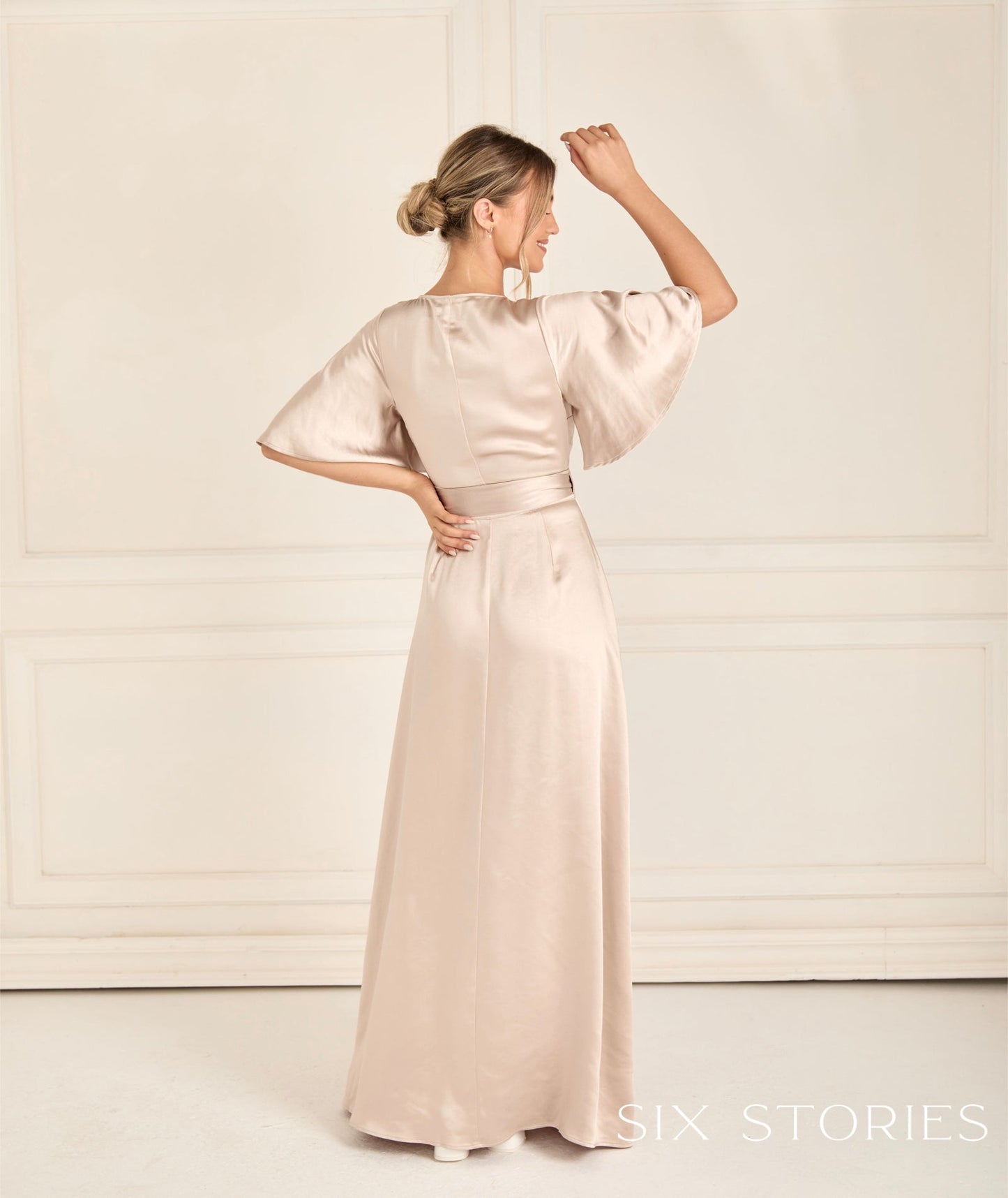 Six Stories wrap over design Size 6 to 22 - Reflections Bridal Studio