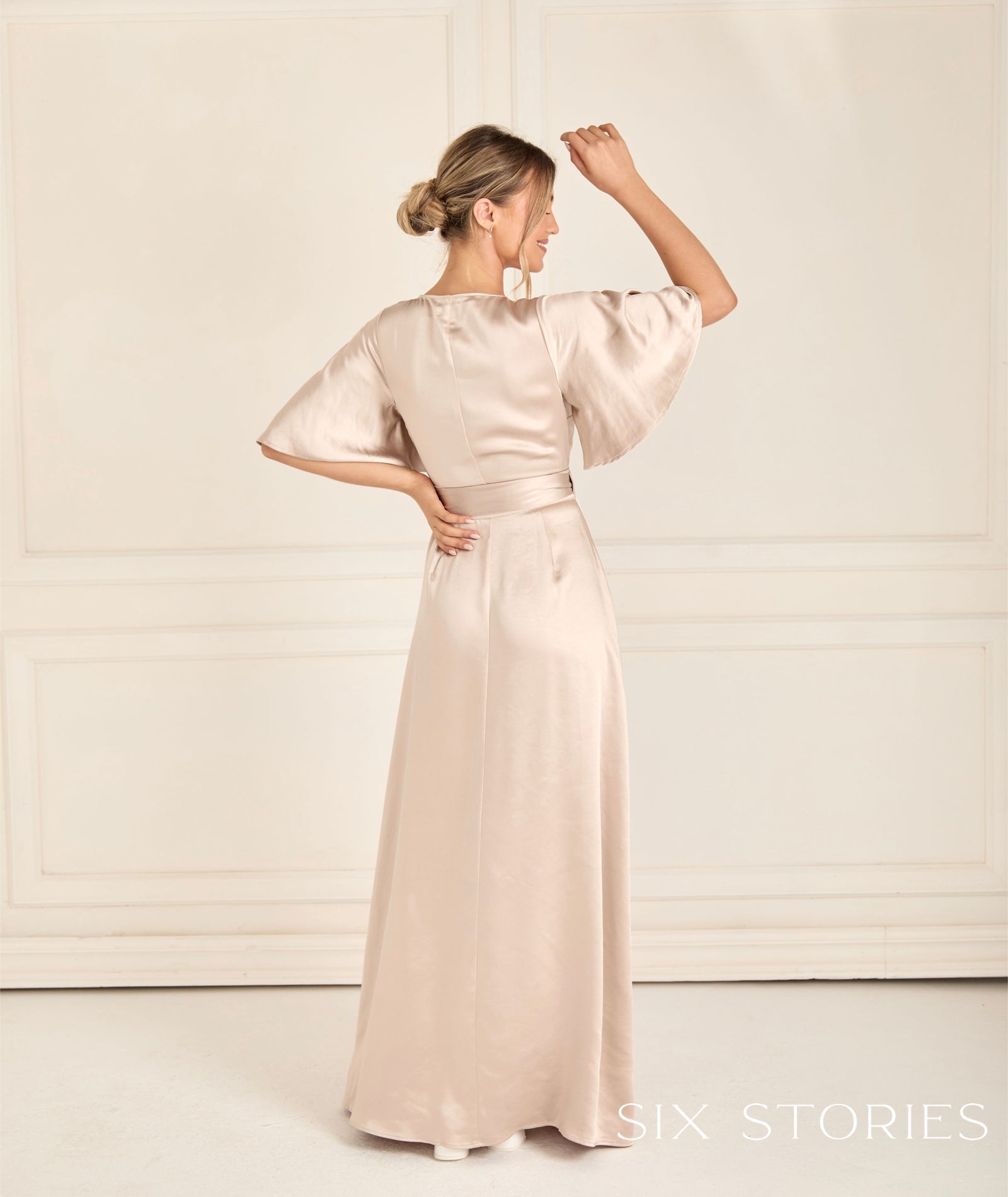Six Stories wrap over design Size 6 to 22 - Reflections Bridal Studio