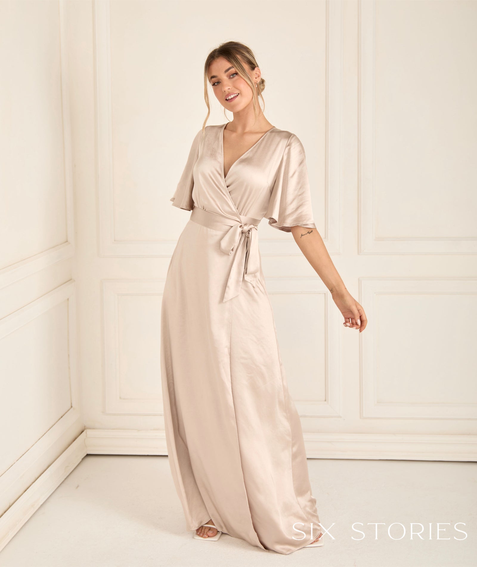 Six Stories wrap over design Size 6 to 22 - Reflections Bridal Studio