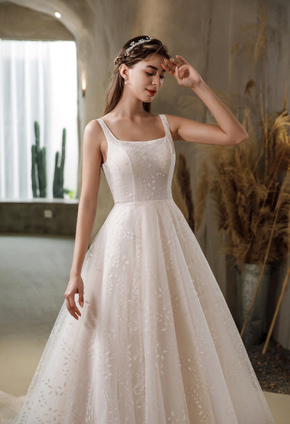 STELLA A light weight gown with good support - Reflections Bridal Studio